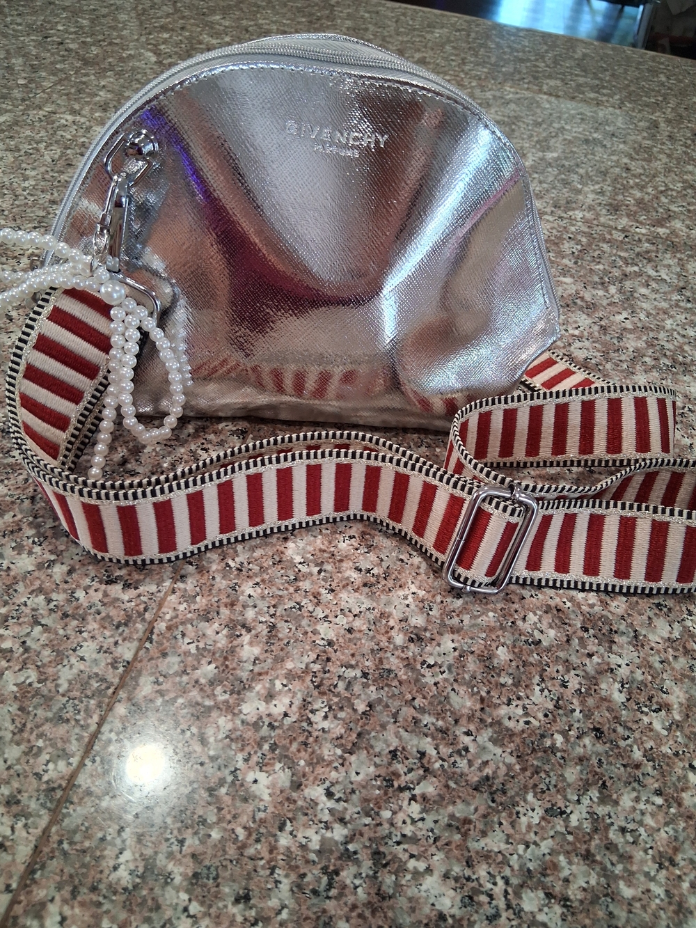 Givenchy GWP Metallic Silver Cosmetic Pouch with Red-Striped Shoulder Strap.